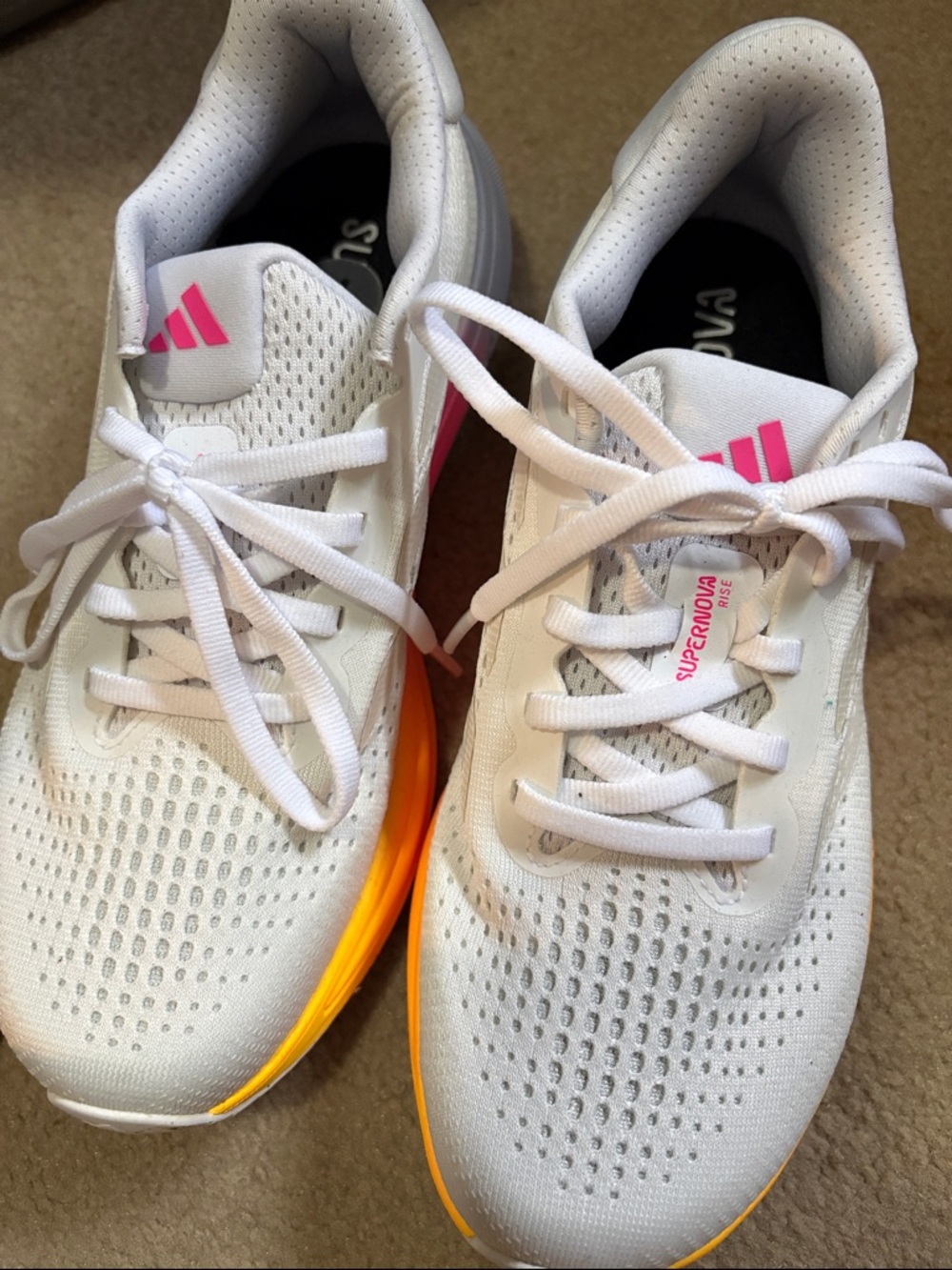 adidas Women’s White Running Sneakers with Pink Accents and Orange Midsole